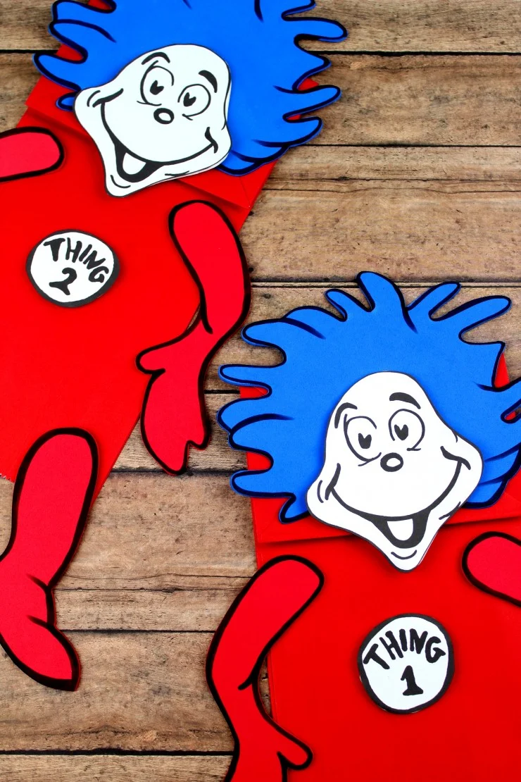This Thing 1 and Thing 2 Paper Bag Puppet Craft is a fun kids craft that ties in really well with The Cat in the Hat. It's a perfect craft for Dr. Seuss day which is coming up on the March 2nd! 