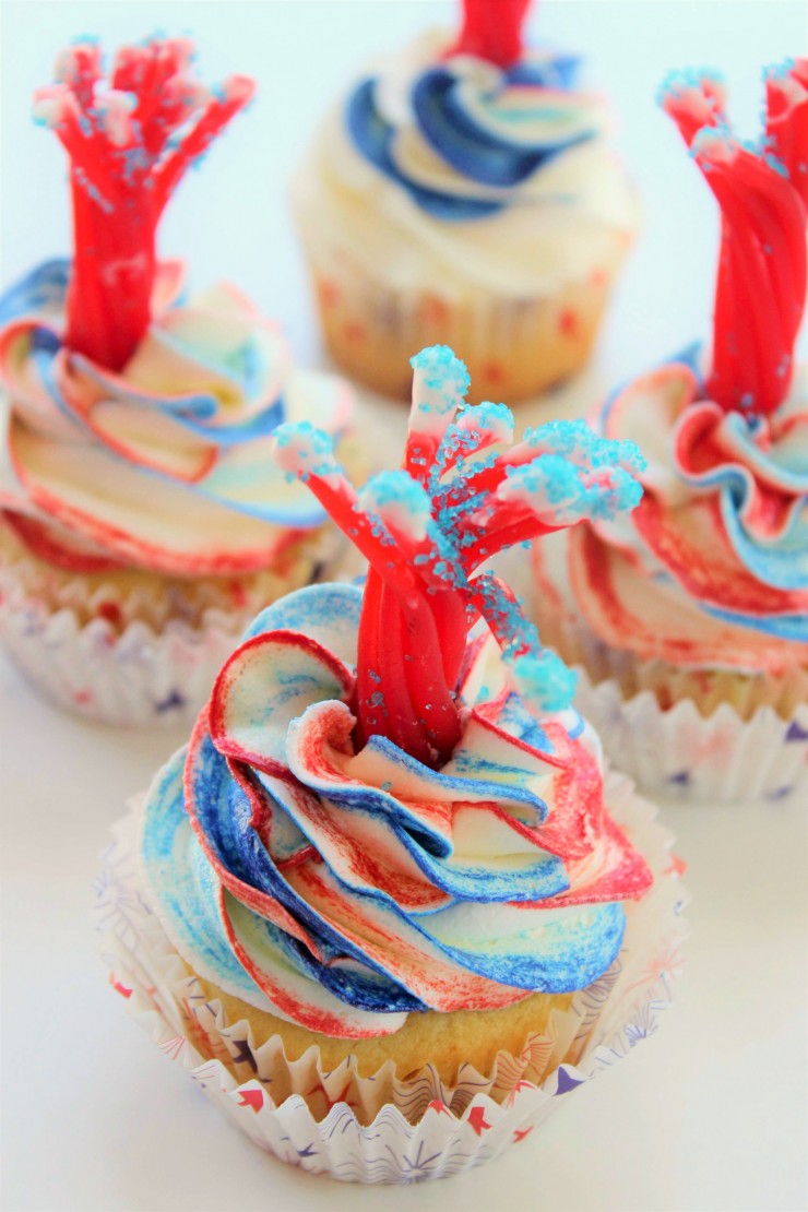 These Firecracker Vanilla Cupcakes are the perfect treat for celebrating memorial day,  July 4th or even Canada day if you leave out the blue.  They are so festive and cute - they are sure to be a hit on any dessert table!