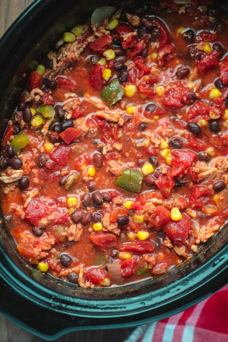 This Slow Cooker Turkey Black Bean Chili is an easy and nutritious meal you can prep ahead and freeze for easy weekday meals.