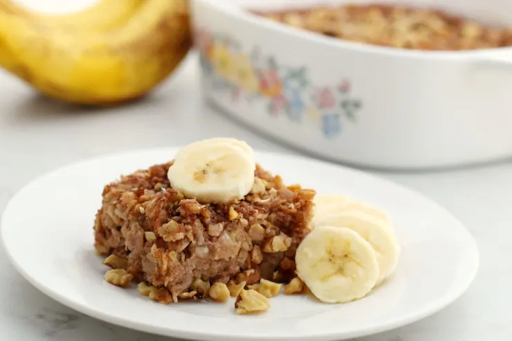Start your morning right with this delicious and comforting Banana Bread Baked Oatmeal. It's an easy breakfast recipe that will fill you up in the most satisfying way!