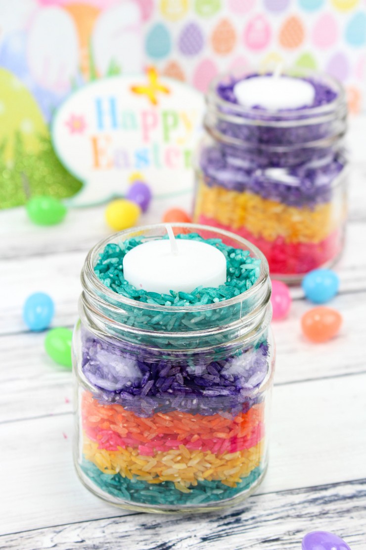 These Easter Rice Candles are super simple and frugal diy Easter tabletop décor your kids can make as soon as they are old enough not to stuff the rice in their face.   Aren't they adorable?