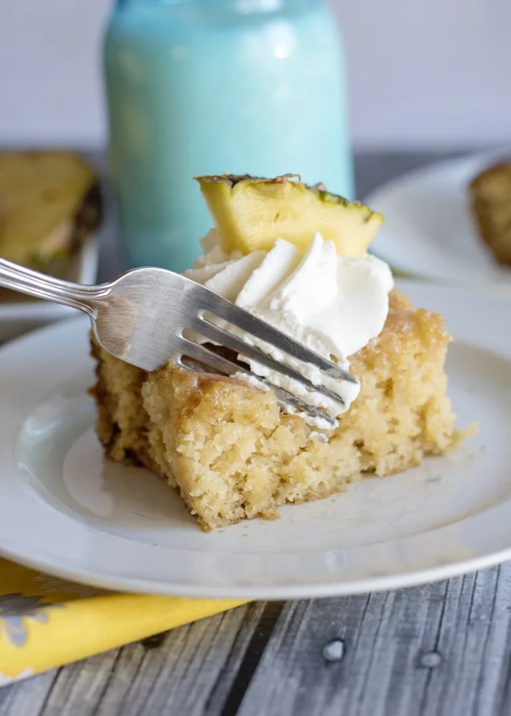 This Pineapple Poke Cake is packed full of tangy sweet flavour that is sure to be a summertime hit.