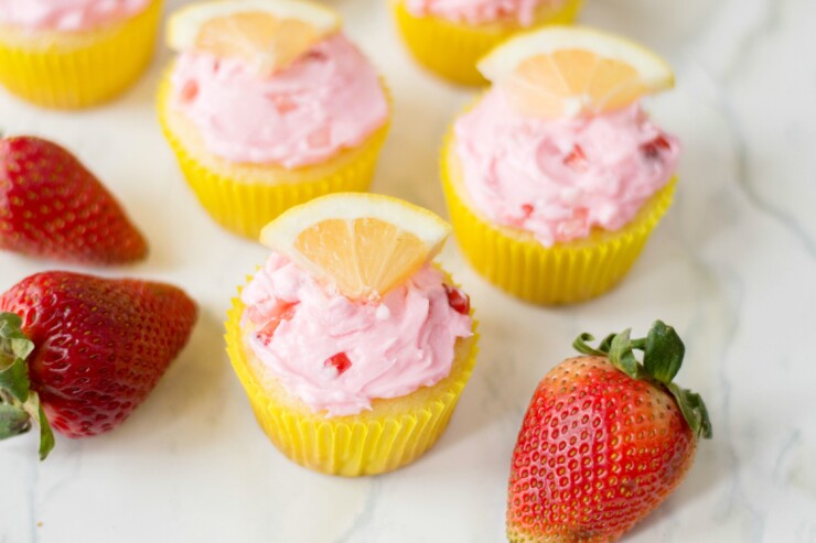 Looking for summer fresh cupcakes? This recipe for lemon strawberry cupcakes couldn't be more full of fresh summer flavours - featuring real strawberries and fresh squeezed lemons!