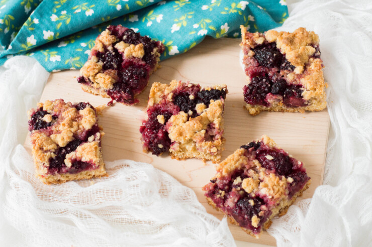These blackberry bars are made with fresh blackberries - a delicious dessert paired with a hot mug of coffee on a summer evening.