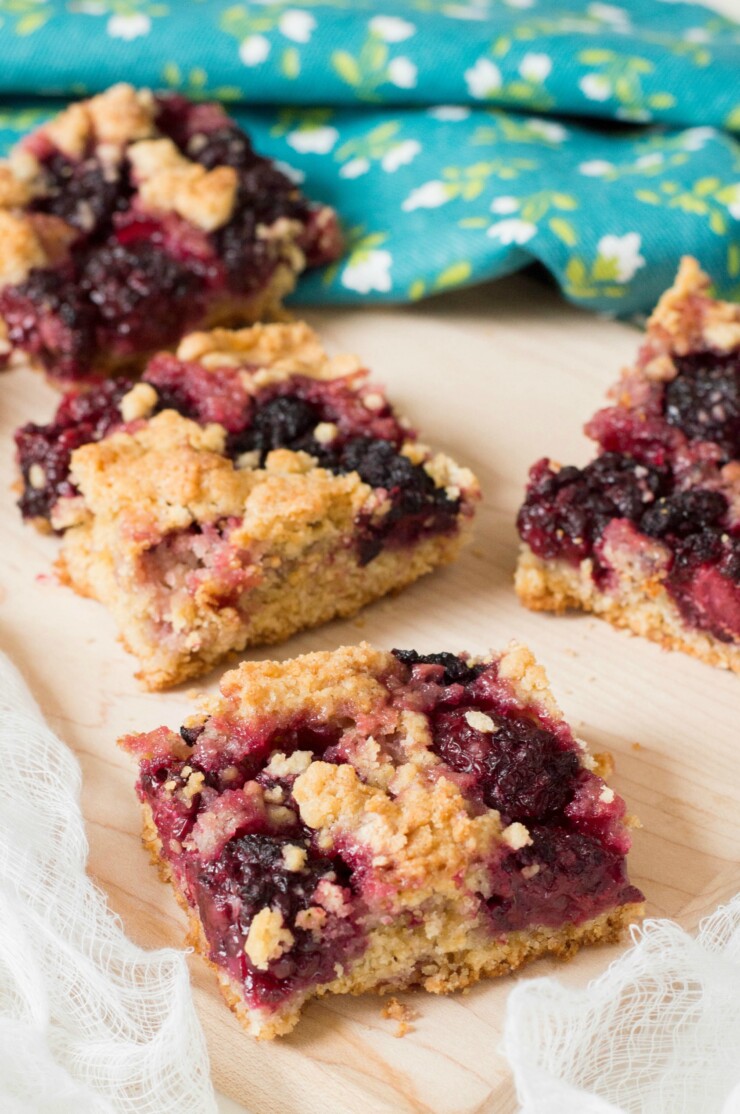 These blackberry bars are made with fresh blackberries - a delicious dessert paired with a hot mug of coffee on a summer evening.