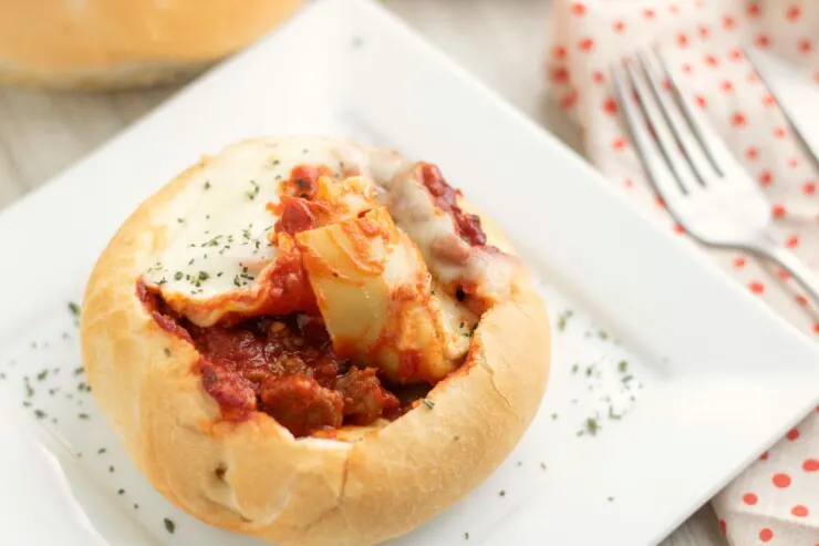 Warm, comforting, gooey and delicious - these Lasagna Garlic Bread Bowls are a fun way to update and enjoy a classic winter favourite. Easy enough to serve your family for a weekday meal, but also impressive enough for a dinner party.