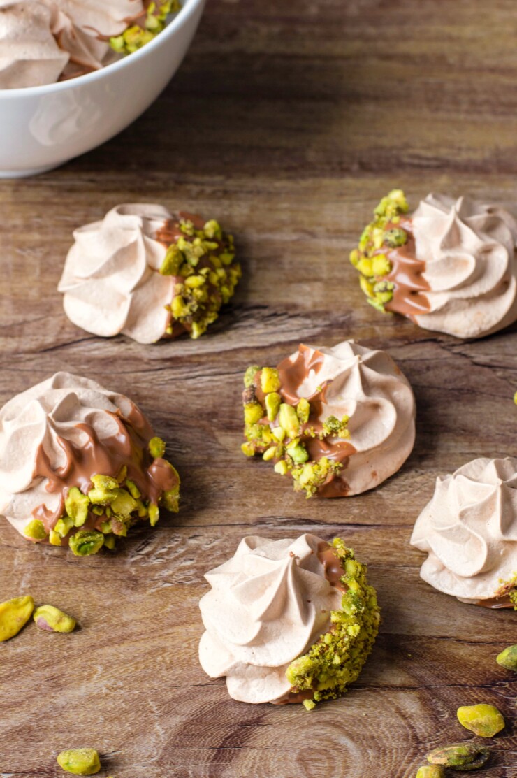 If you are looking for a real show-stopper dessert then these Chocolate & Pistachio Meringue Cookies are just what you are looking for. These melt in your mouth meringues are dipped in chocolate and sprinkled with pistachio bits.