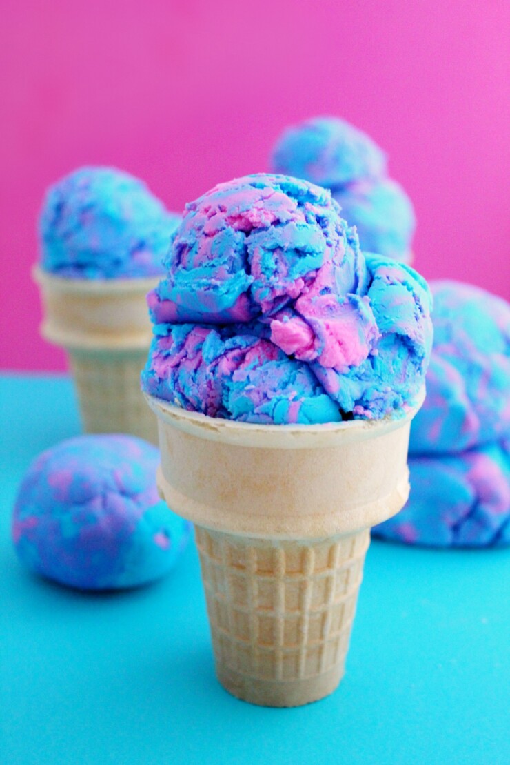This 2-Ingredient Cotton Candy Ice Cream Play Dough is Gluten Free and edible. Kids will enjoy playing with this play dough with ice cream cones, an ice cream scoop, sundae bowls, maybe even sprinkles for some imaginative fun!