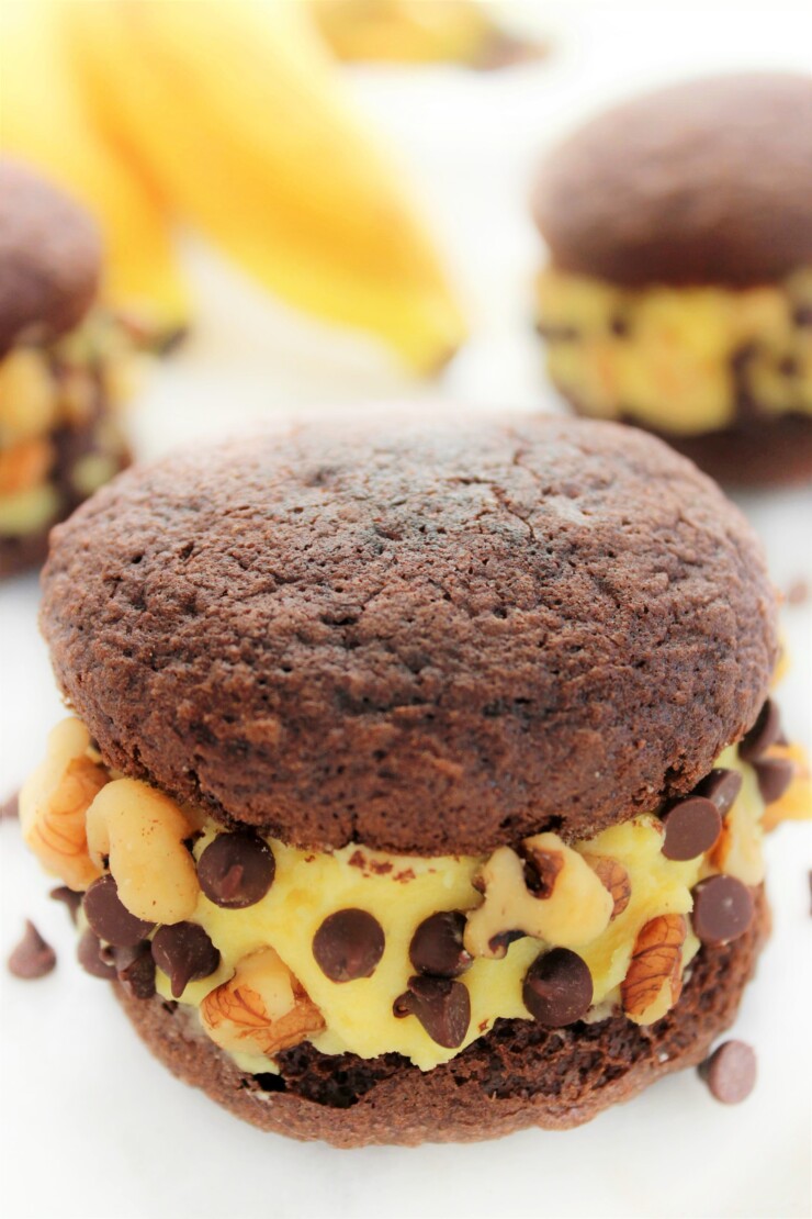Inspired by Ben & Jerry’s Chunky Monkey Ice Cream, these Chunky Monkey Whoopie Pies are a perfect treat with chocolate, banana and walnuts coming together for one amazing dessert!