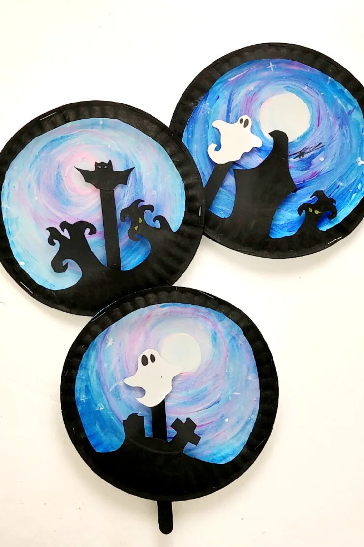 This fun Paper Plate Halloween Scene Puppet craft features a ghost or bat puppet that kids can move around a spooky backdrop. I love kids crafts that have a purpose after the craft is complete and this one really inspires imaginative play.