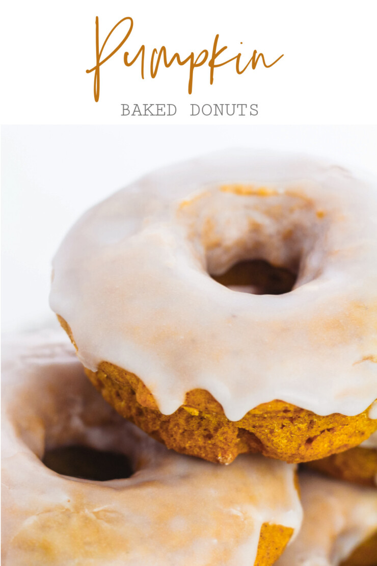 An easy recipe for Baked Pumpkin Donuts that results in soft fluffy and flavourful cake donuts without yeast in just 30 minutes. Coated in a simple vanilla glaze to perfectly complement the pumpkin spice flavours.
