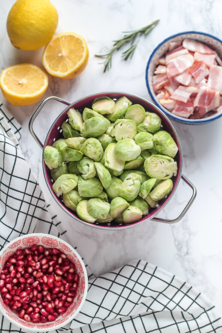Pan Roasted Brussels Sprouts with Bacon & Pomegranate makes for a tasty holiday side dish that works just as easily for a weeknight side. You won't want to wait until Christmas or Thanksgiving dinner to serve these brussels sprouts!