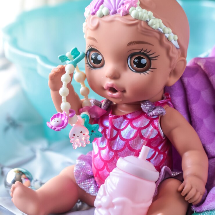 Surprises Baby Doll with Purple Towel with 20 BABY born Surprise Mermaid Surprise