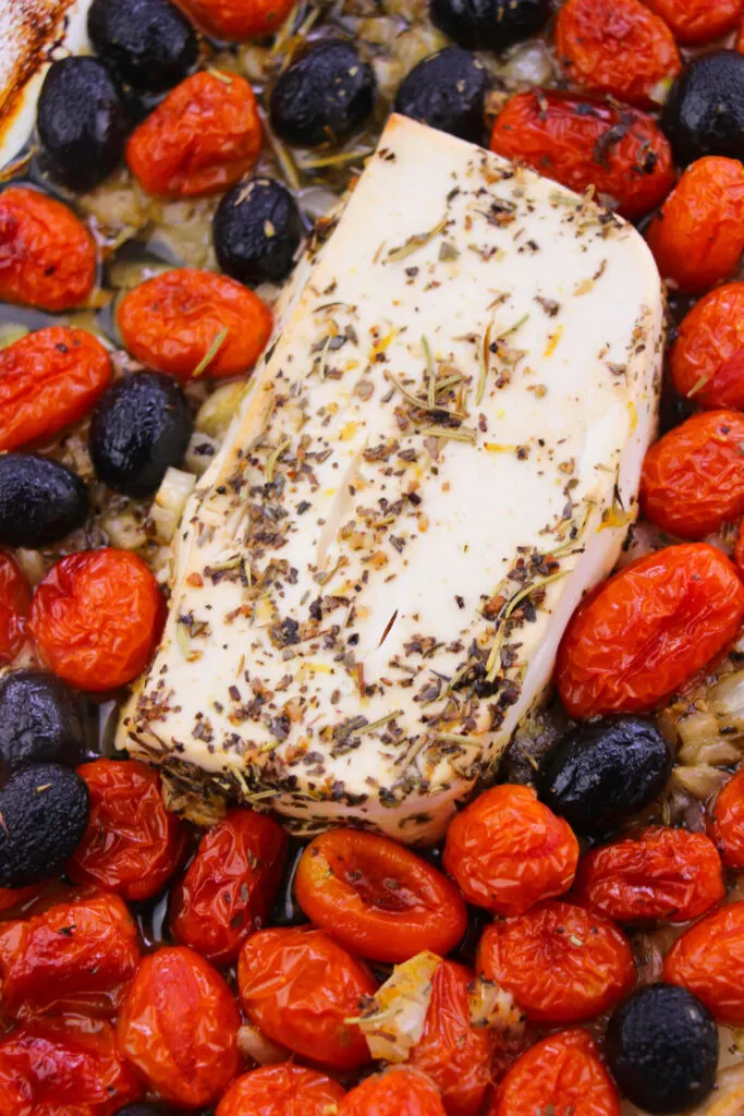 Feta baked in herbs with cherry tomatoes and olives.