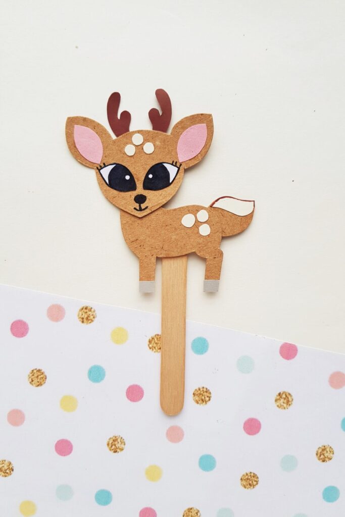 This Papercraft Deer Puppet is an easy kids paperfcraft animal project with a free papercraft template to help you make this cute kids craft.
