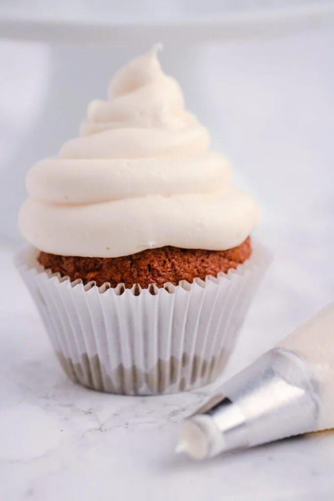 Make the best cream cheese frosting with this easy recipe. This sweet and tangy frosting is perfectly creamy, but pipes like a dream.