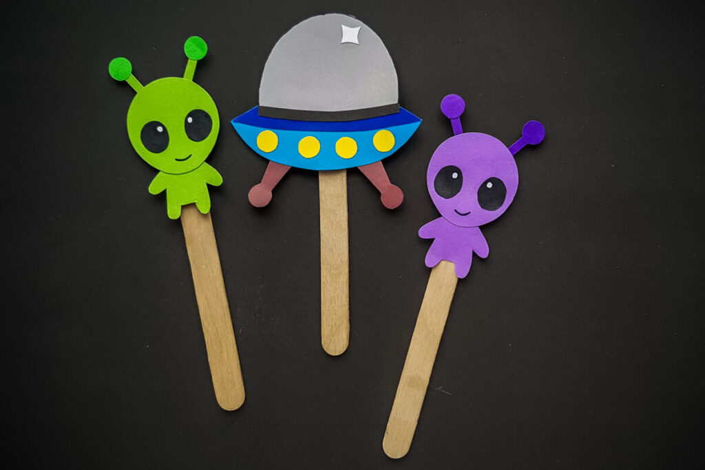 These Papercraft Alien Craft Stick Puppets are made easy with a free papercraft template to help you make this kids craft.