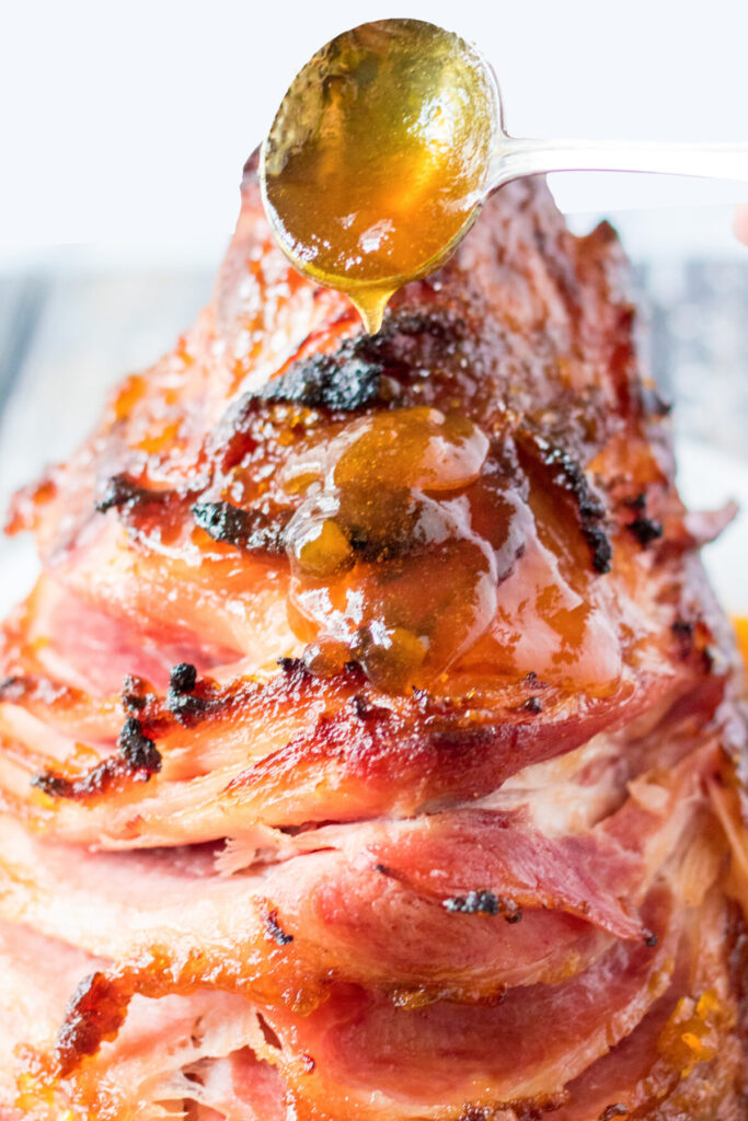 Peach Glazed Spiral Ham is a delicious sweet and salty spiral cut ham that you can serve for Easter, Christmas, or any special Occasion!
