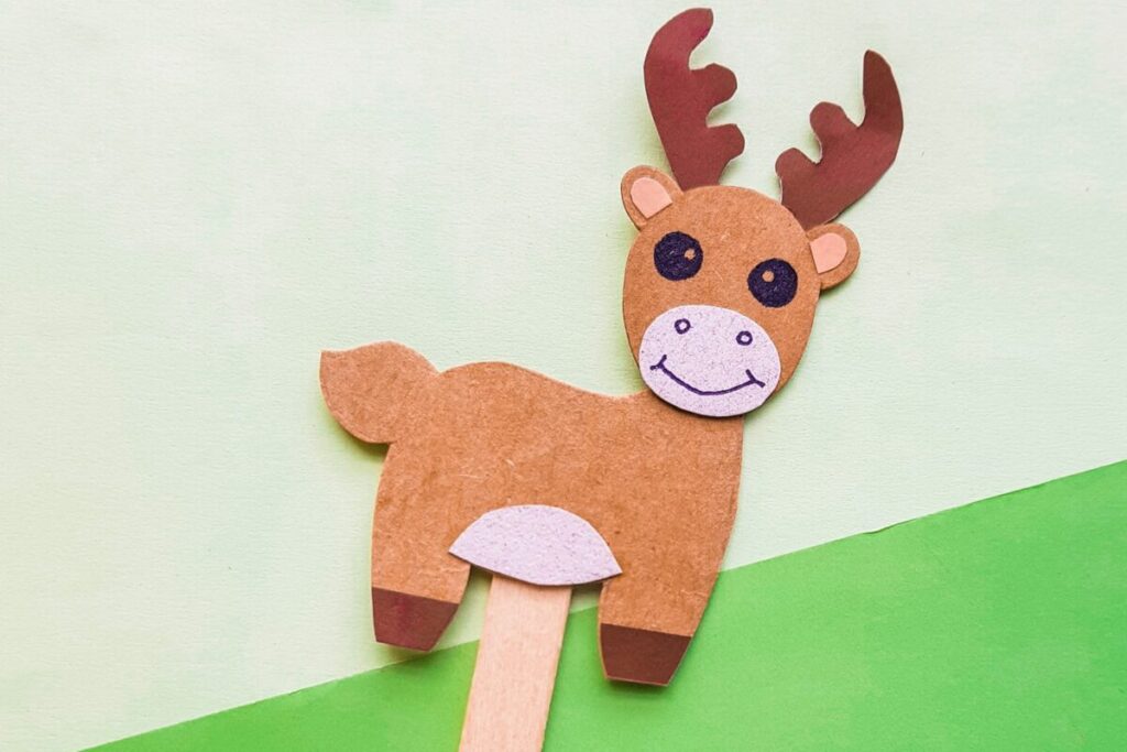 This Papercraft Moose Puppet is an easy kids paperfcraft animal project with a free papercraft template to help you make this kids craft.