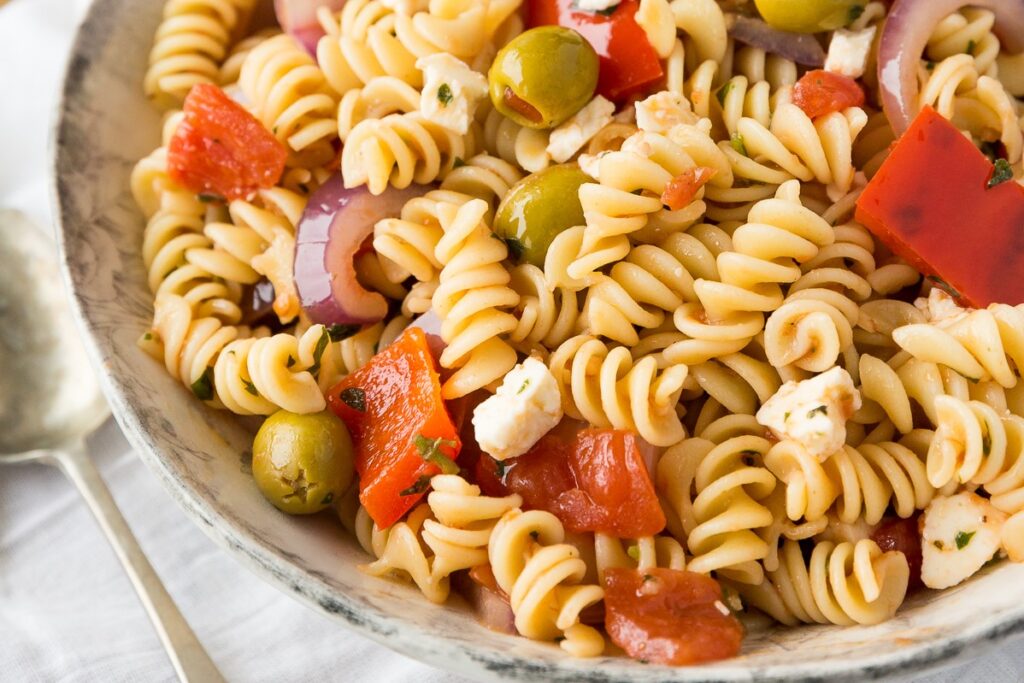 Calabrese pasta salad is wonderful pasta dish featuring roasted red peppers served either warm or cool as a side dish or entrée.