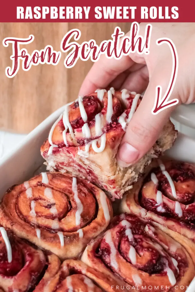 Raspberry Sweet Rolls - soft, fluffy and sweet yeast rolls filled with raspberries and smothered with cream cheese frosting.