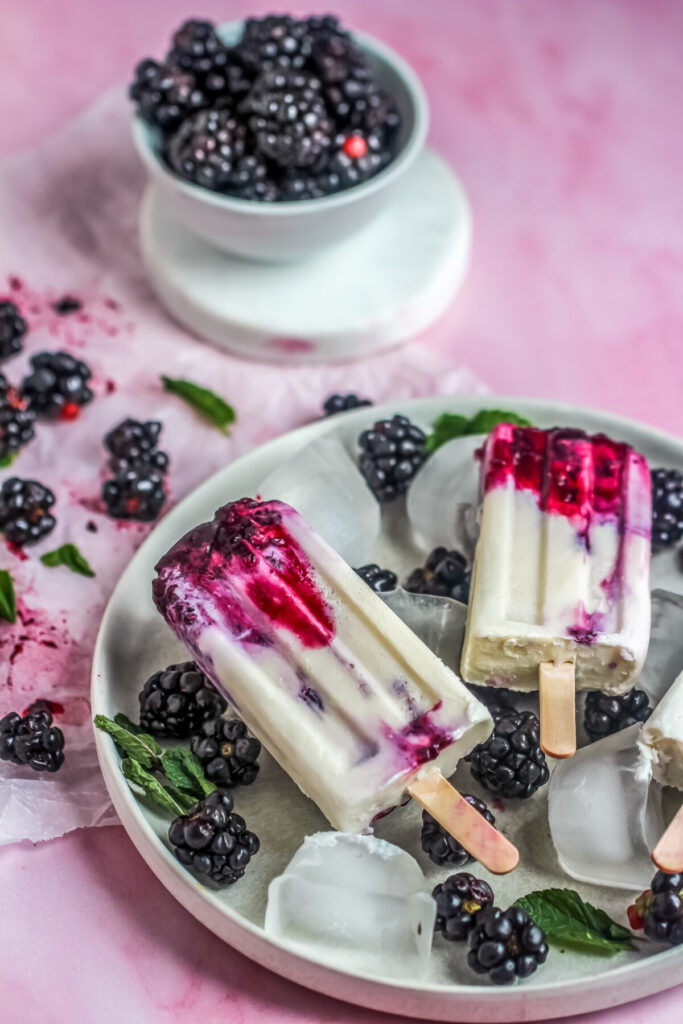 Cool off this summer with these Berries and Cream Ice Pops made with real cream, mixed summer berries, and a touch of honey.