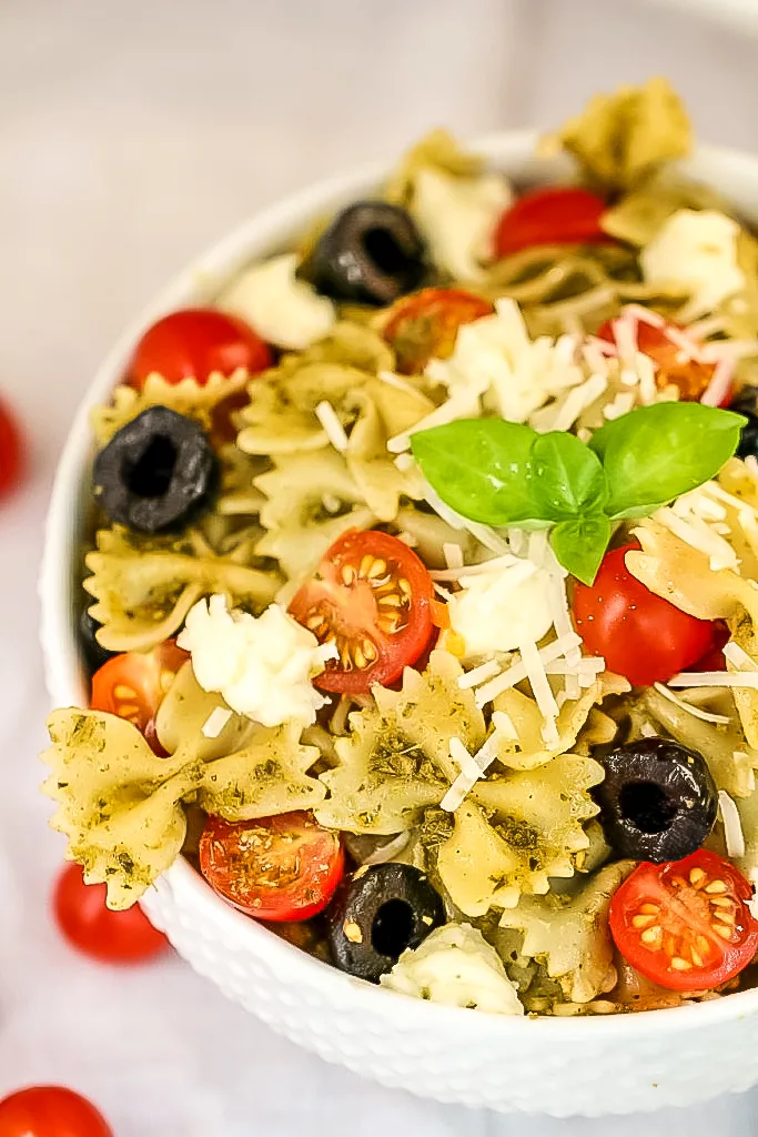 This Pesto Pasta Salad Recipe features bow tie pasta and fresh ingredients for a summer salad or side dish that is full of flavour!