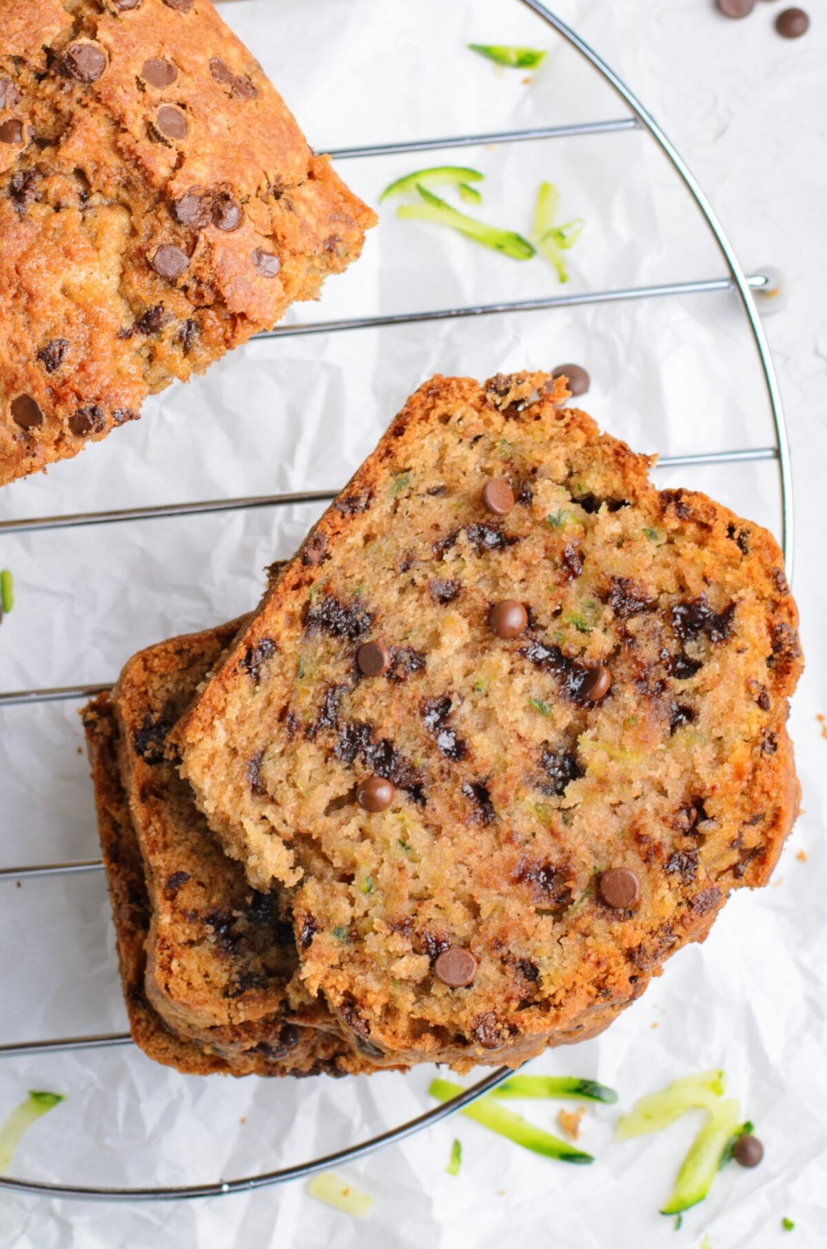 The BEST Chocolate Chip Zucchini Bread Recipe ever! Super moist, soft, and loaded with chocolate chips; it's a tasty way to use up zucchini.
