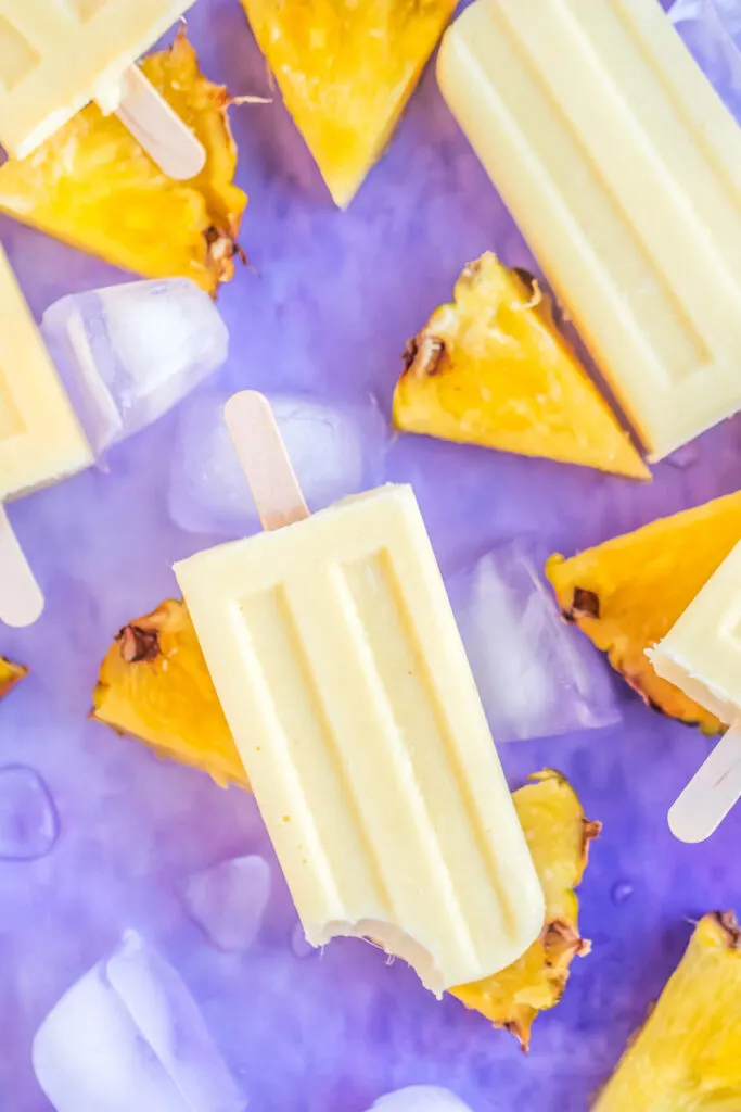 Homemade Dole Whip Ice Pops are a Disney Copycat recipe inspired by the famous treat. A summer treat made with pineapple and real cream,