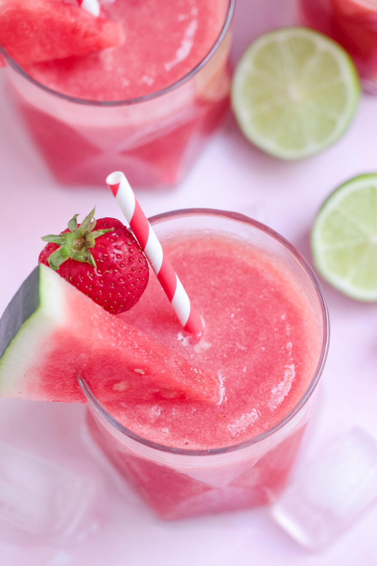 Fresh strawberry watermelon slushie made with real fruit, lime, ice, and optional sugar for a refreshing summer drink. Easy blended recipe perfect for hot days.