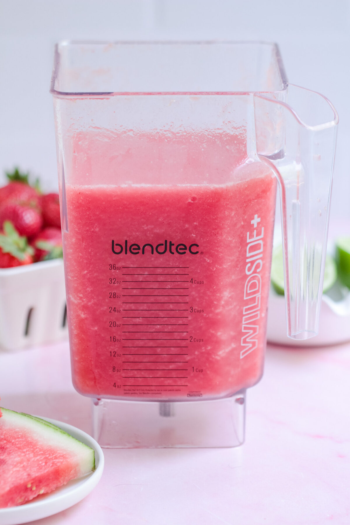 Strawberry watermelon slushie in the blender.