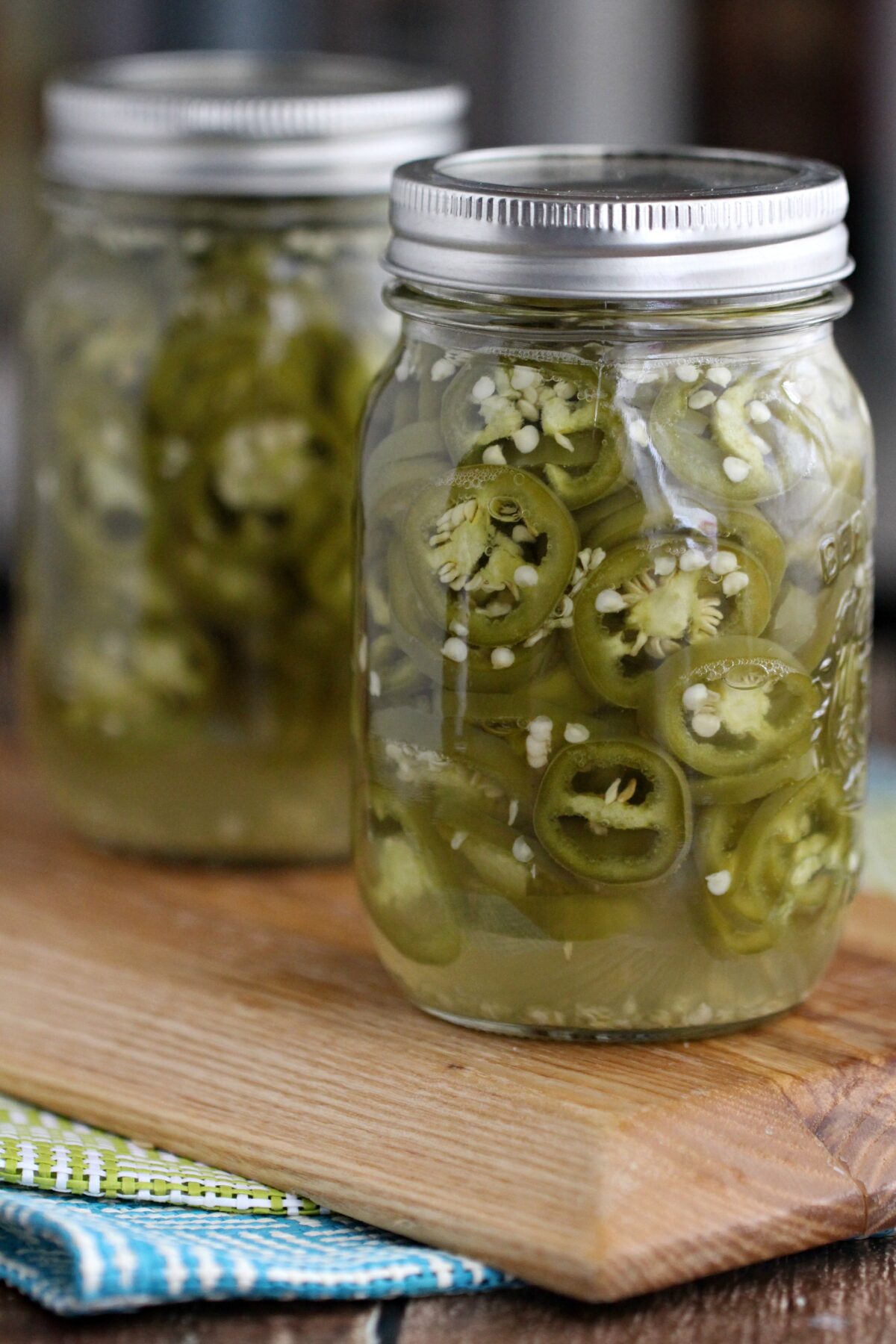 Make Perfect Pickled Jalapeño Peppers with this quick and easy canning recipe. These are super hot and spicy!