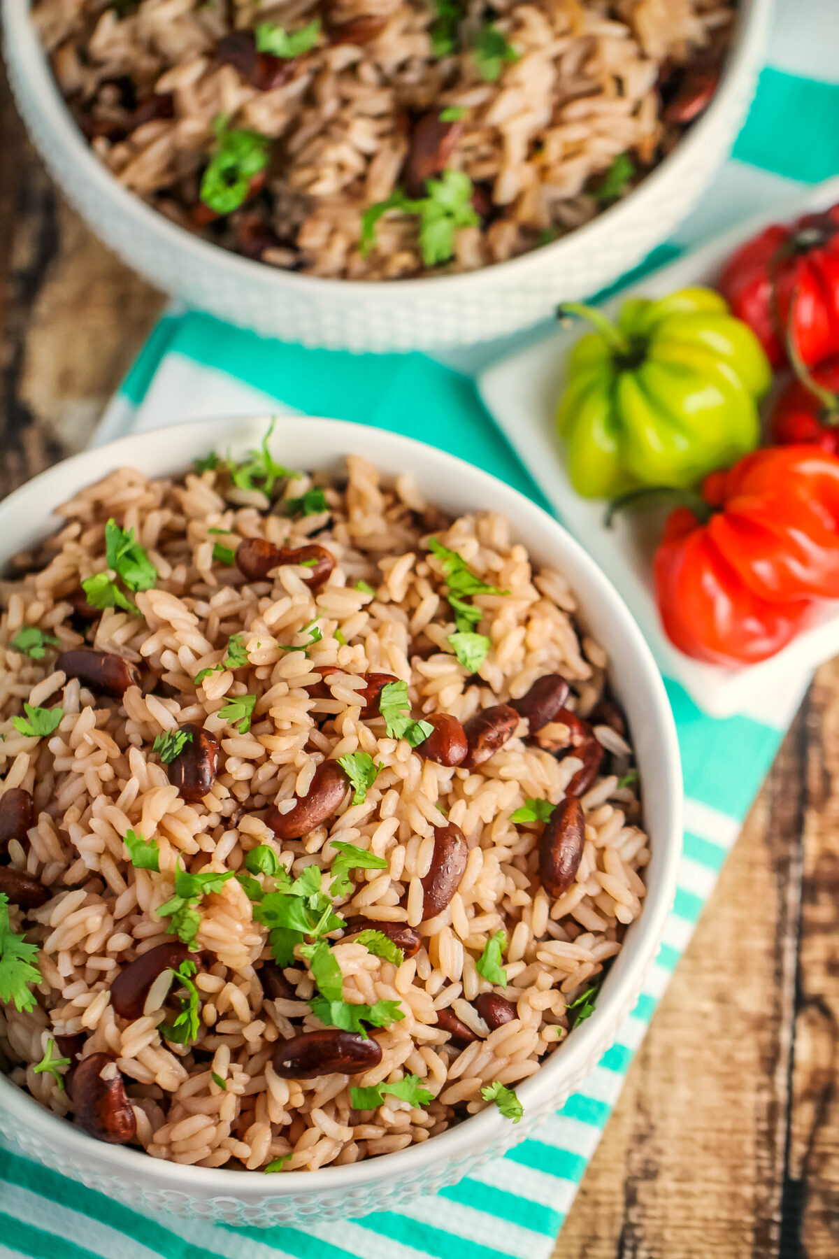 This Jamaican Rice and Peas recipe is an authentic recipe for the traditional Jamaican side dish featuring fragrant thyme and coconut milk! 