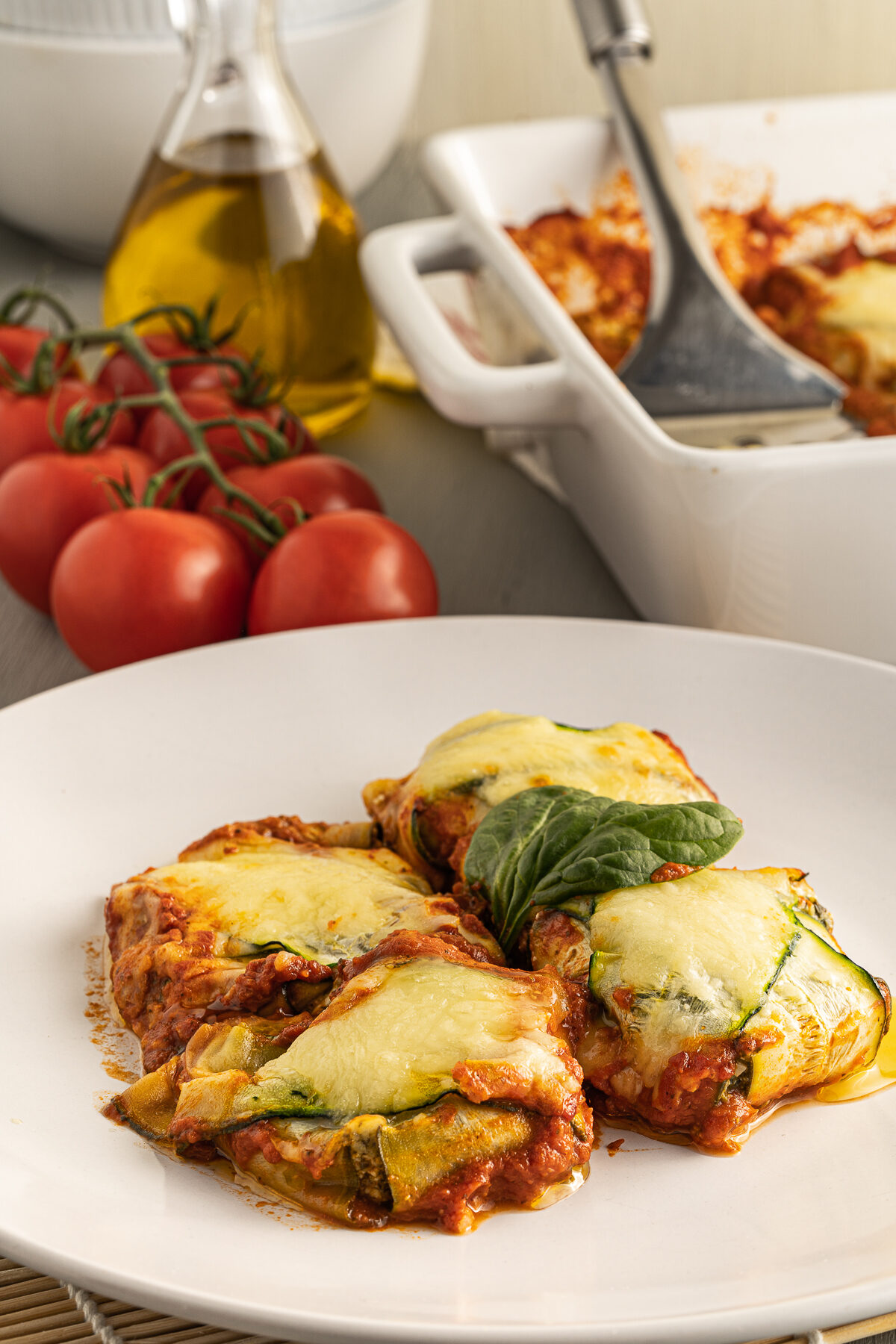 Zucchini ravioli is an easy to make Keto friendly family meal. Filled with cheese and spinach, it's a satisfying & tasty vegetarian dish!