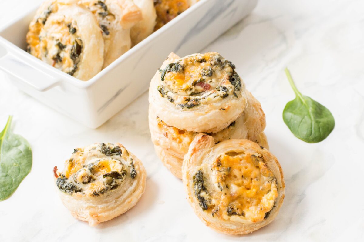 When it comes to entertaining, having an easy appetizer in your repertoire like these delicious Bacon Spinach Pinwheels is a must.