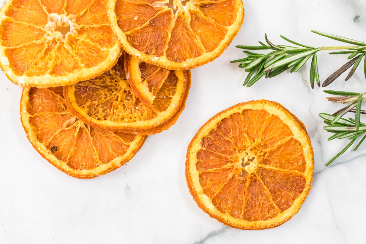 An excellent way to preserve oranges, dried orange slices can be used for craft projects, drink garnishes, or snacking.