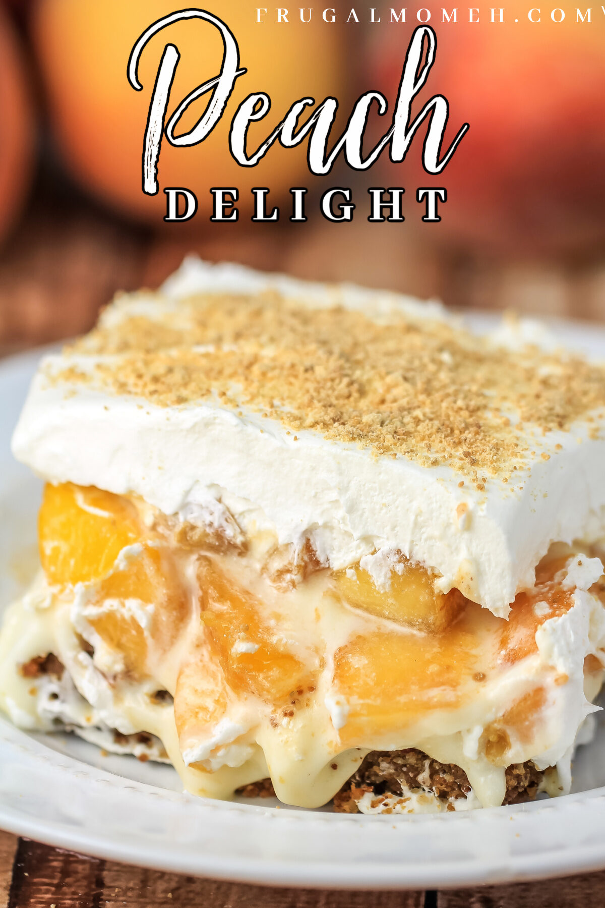 Luscious layers of pecan, cheesecake, fresh peaches and finished with a layer of whipped topping - Peach Delight with Pecan Crust is a delicious summer dessert recipe.