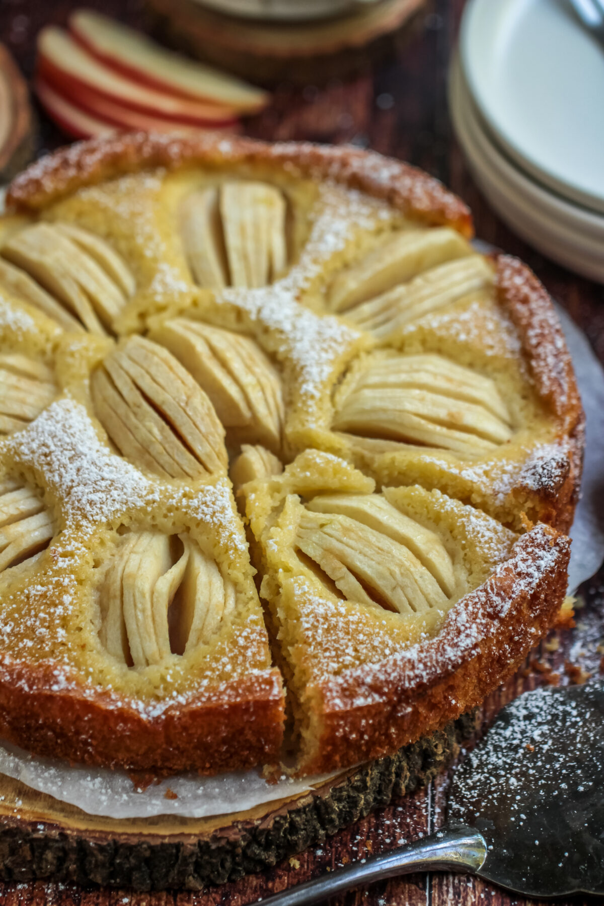 Classic German apple cake, Apfelkuchen, is moist and buttery. It's a simple and rustic cake made with fresh apples - a perfect fall dessert.