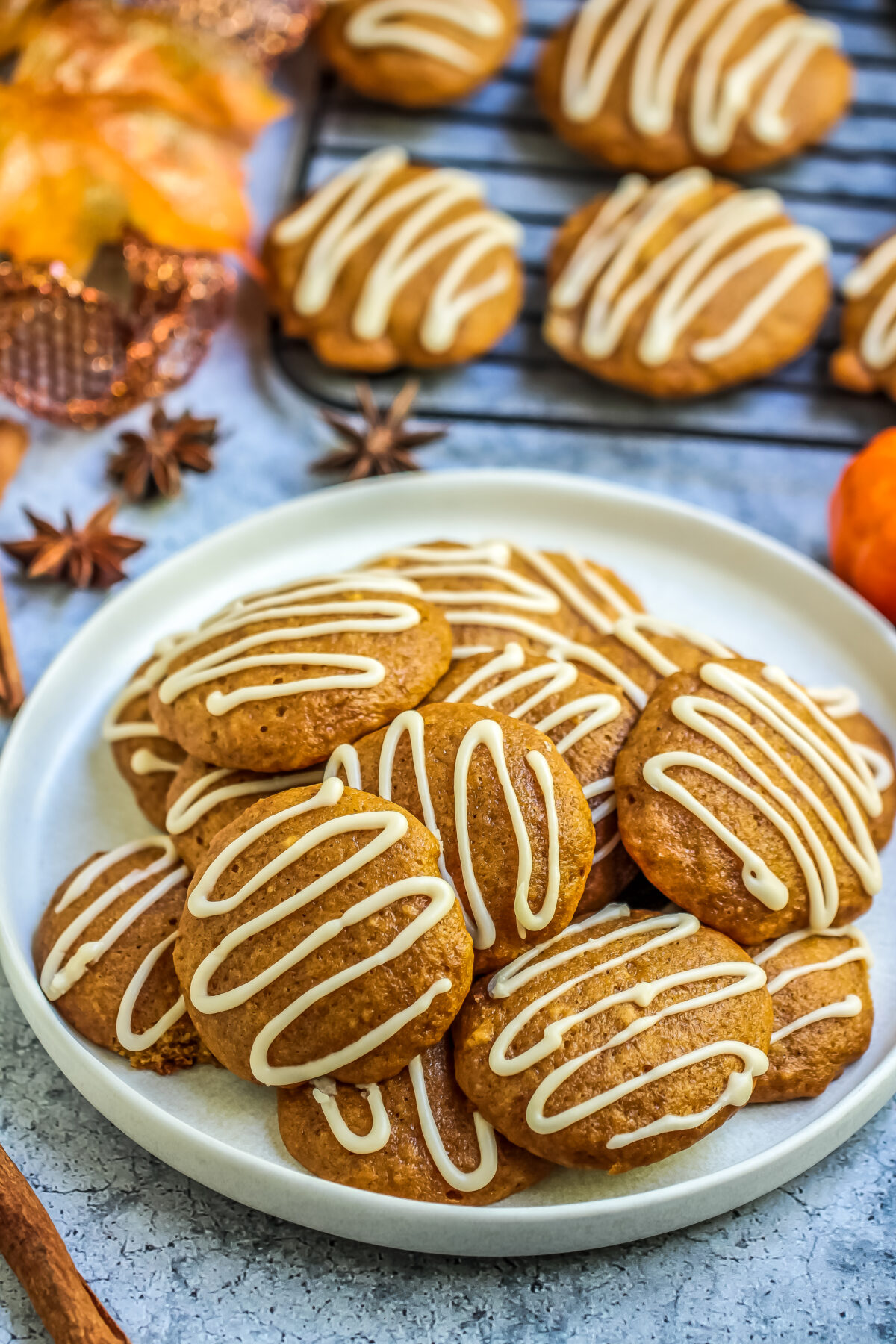 These soft and cakey pumpkin spice cookies with maple icing offer just the right amount of sweetness and a delicious kick of pumpkin spice.