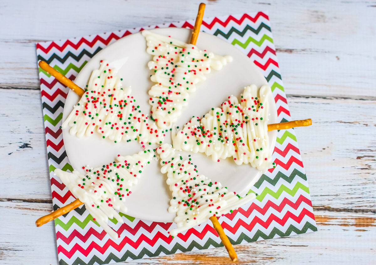 These White Chocolate Christmas Trees are perfect for serving at holiday parties as cupcake toppers, edible holiday gift ornaments, and more!