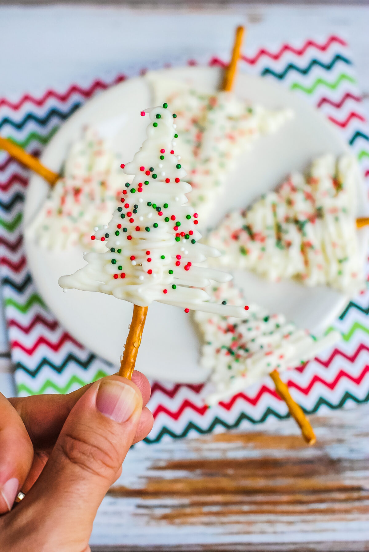 These White Chocolate Christmas Trees are perfect for serving at holiday parties as cupcake toppers, edible holiday gift ornaments, and more!