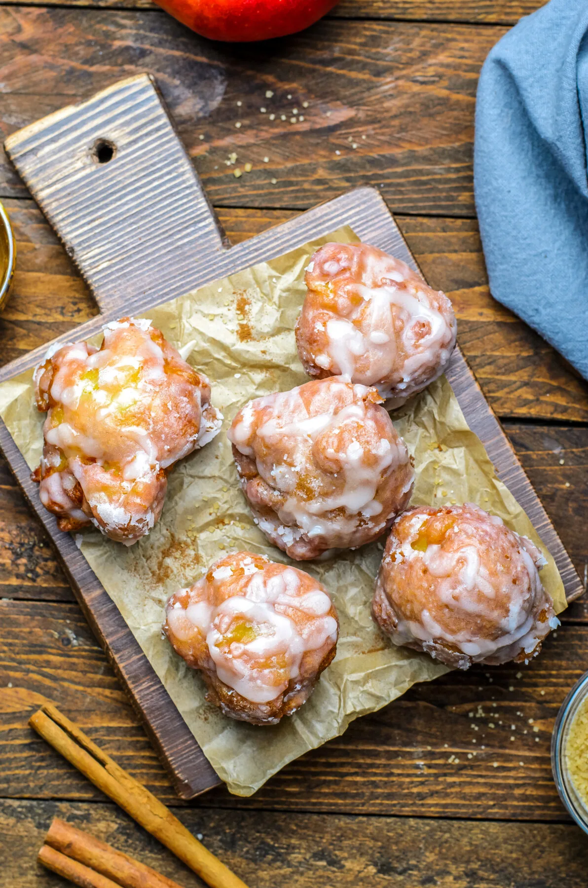 These Old Fashioned Apple Fritters are made with a cakey batter incorporated with juicy apples and glazed. They're an easy-to-make fall treat.