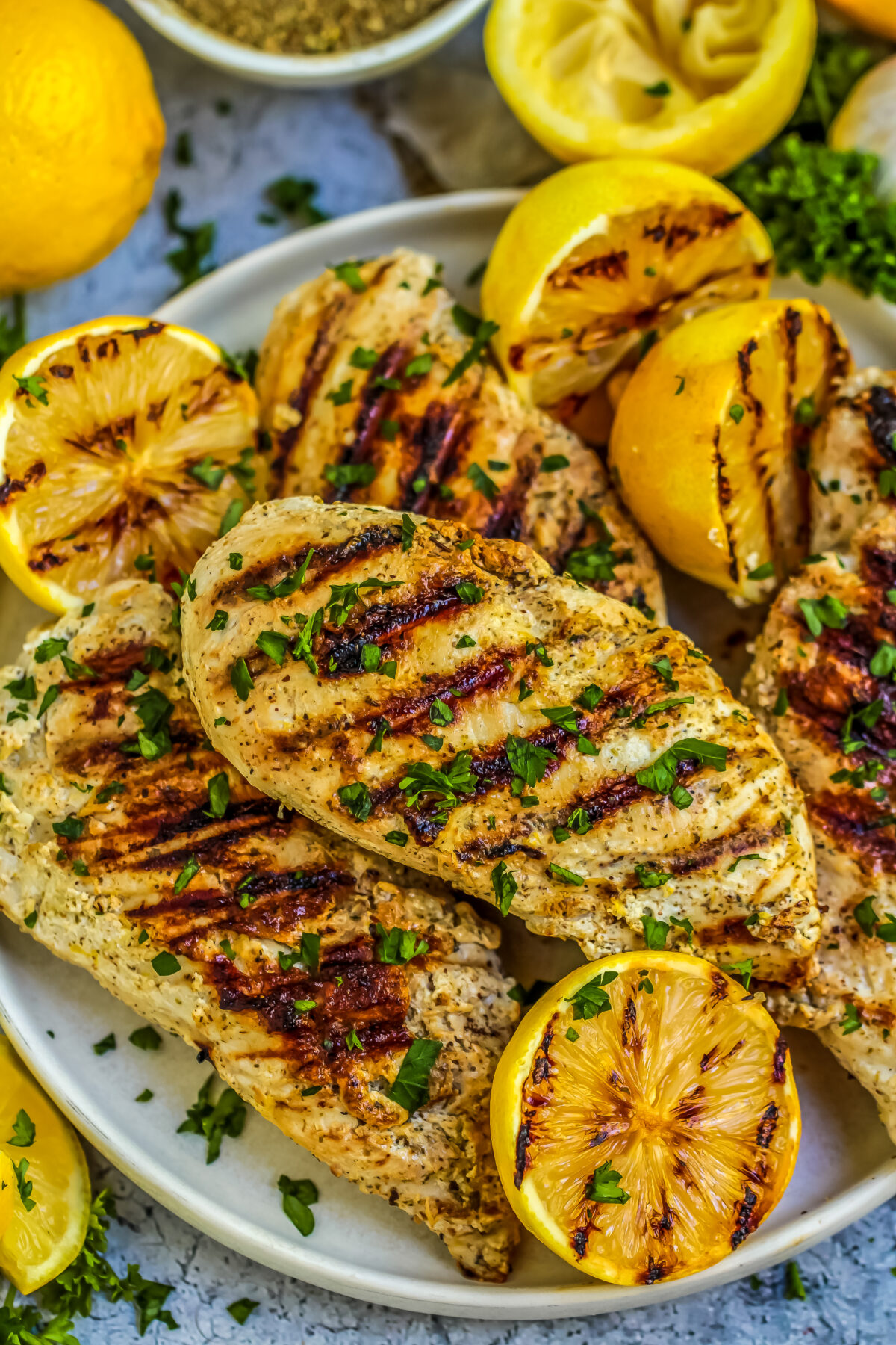 Tender and juicy, Greek yogurt marinated chicken infuses garlic, lemon and oregano together for a flavour loaded Greek chicken dinner.