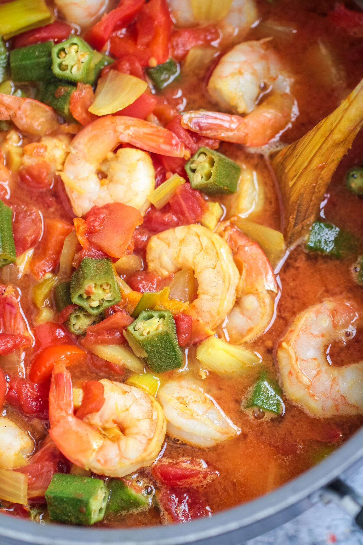 This Caribbean Okra and Shrimp recipe is a simple, spicy, and flavourful stew featuring plump shrimp, crisp okra and scotch bonnet peppers.