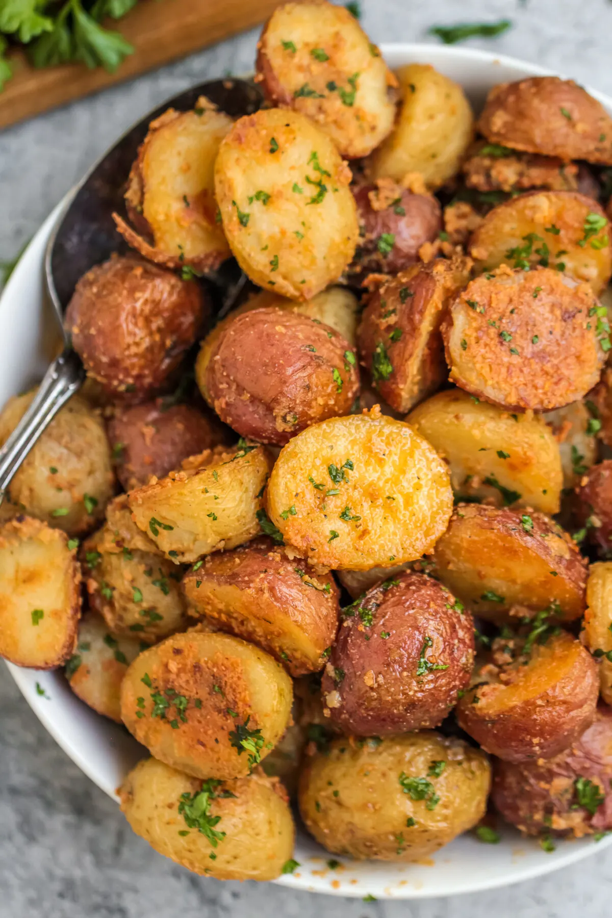 This recipe for crispy roasted garlic parmesan baby potatoes is an easy side dish that's great with any meal.