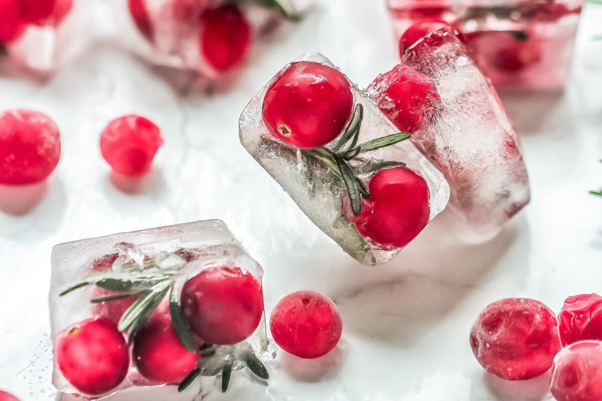 These cranberry ice cubes are so easy to make, they're perfect for holiday parties. They add a festive touch of colour to your next event!