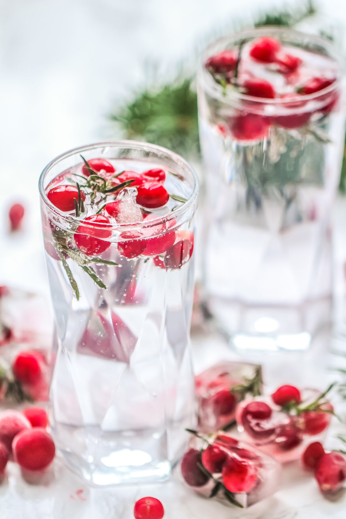 These cranberry ice cubes are so easy to make, they're perfect for holiday parties. They add a festive touch of colour to your next event!