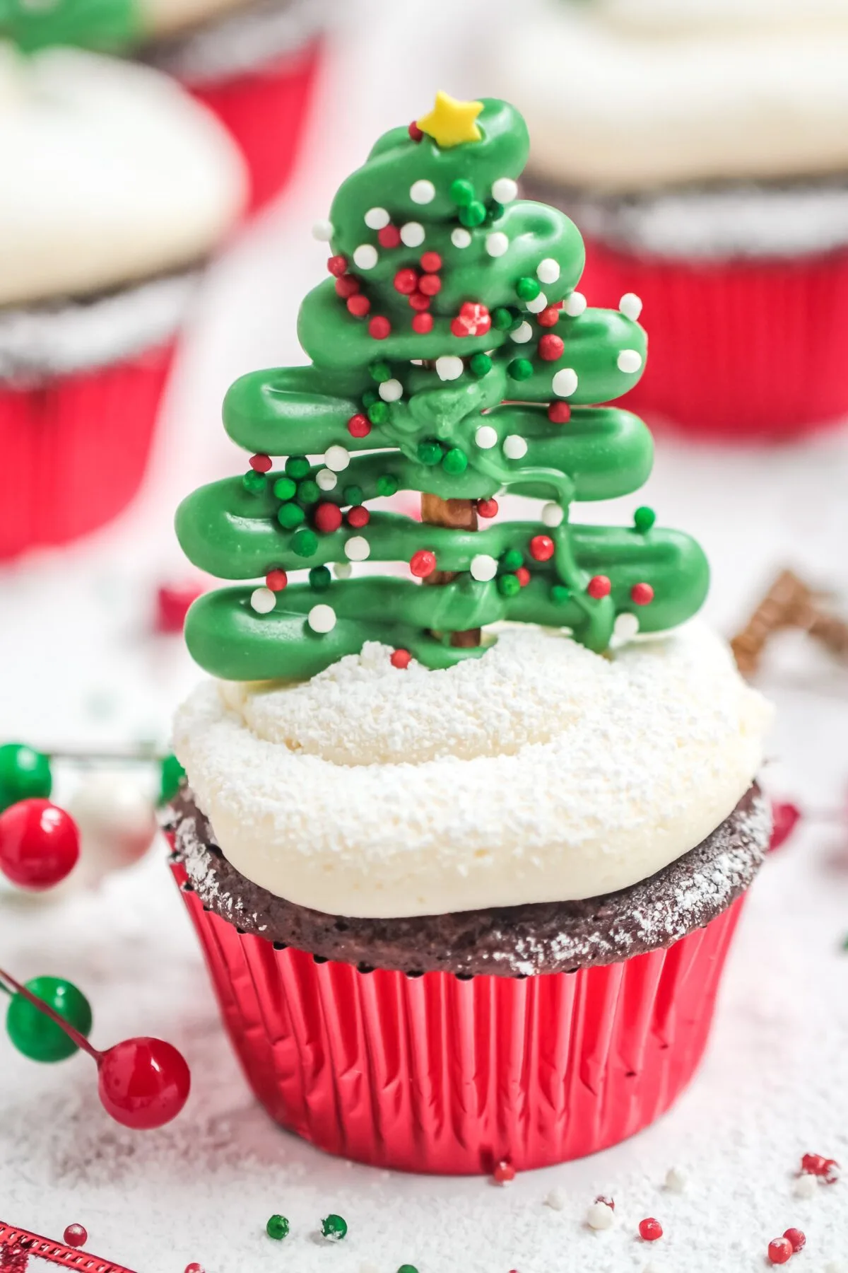 This festive and fun Christmas tree cupcakes recipe make a great treat for the holidays, featuring moist, fluffy homemade chocolate cupcakes!