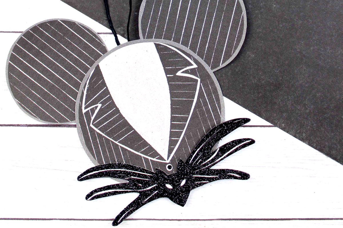 Make your own Jack Skellington Suit Mickey Ears Christmas ornament with this easy to follow tutorial. Free printable template included!