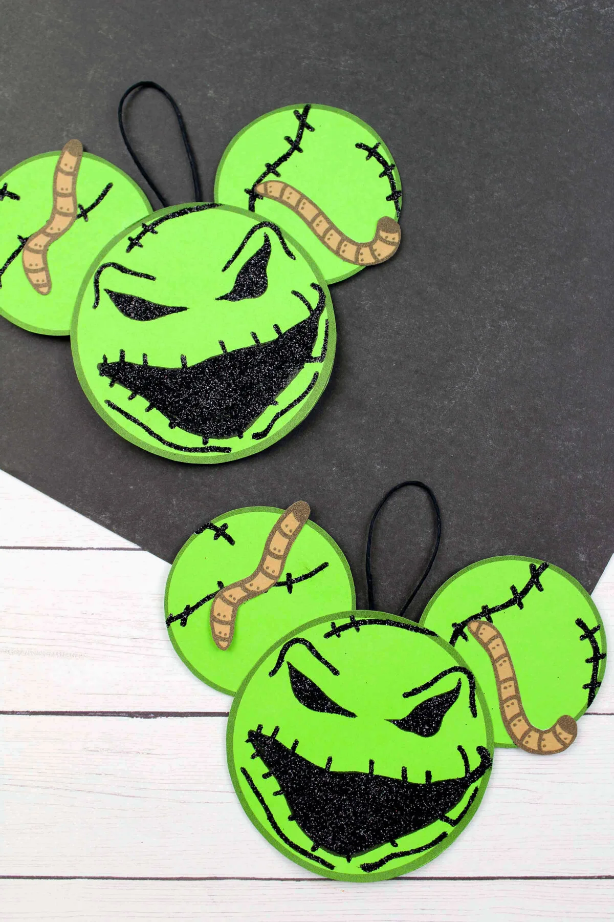 Make this easy DIY Oogie Boogie Mickey Ears Ornament as part of your Disney inspired Christmas tree decorations. Free printable template!